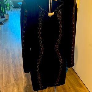 Amazing dress in new conditions with spiked shoulder and chain . Perfect fit